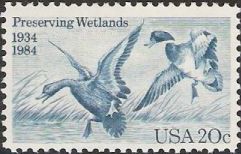 Blue 20-cent U.S. postage stamp picturing ducks