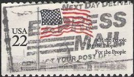22-cent U.S. postage stamp picturing American flag over United States Capitol