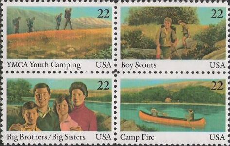 Block of four 22-cent U.S. postage stamps picturing people participating in outdoor activities