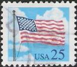 25-cent U.S. postage stamp picturing American flag and clouds