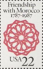 Red & black 22-cent U.S. postage stamp picturing geometric design