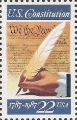 22-cent U.S. postage stamp picturing Constitution and hand with quill pen