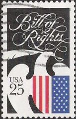 25-cent U.S. postage stamp picturing outline of eagle and shield
