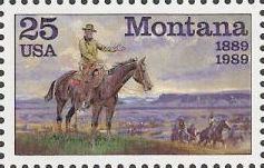 25-cent U.S. postage stamp picturing cowboys on horseback