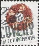 32-cent U.S. postage stamp picturing Christmas wreath