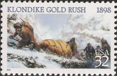 32-cent U.S. postage stamp picturing prospectors with sled