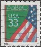 33-cent U.S. postage stamp picturing flag and chalkboard