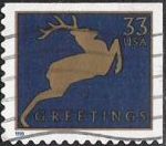 Blue & gold 33-cent U.S. postage stamp picturing deer