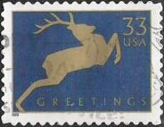 Blue & gold 33-cent U.S. postage stamp picturing deer