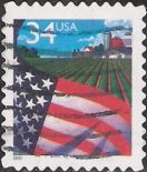 34-cent U.S. postage stamp picturing American flag and farm