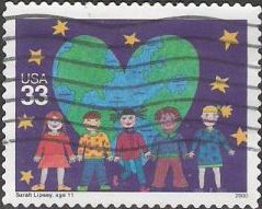 33-cent U.S. postage stamp picturing children and heart-shaped Earth