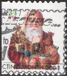 34-cent U.S. postage stamp picturing Santa Claus holding toys