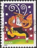 37-cent U.S. postage stamp picturing reindeer playing horn