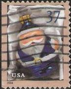 37-cent U.S. postage stamp picturing blue Santa Claus Christmas ornament