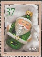 37-cent U.S. postage stamp picturing green Santa Claus Christmas ornament