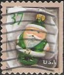 37-cent U.S. postage stamp picturing green Santa Claus Christmas ornament