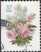 37-cent U.S. postage stamp picturing lilacs and roses