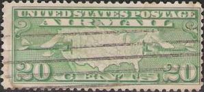 Green 20-cent U.S. postage stamp picturing map of United States and two airplanes