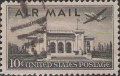 Black 10-cent U.S. postage stamp picturing airplane over Pan American Union building