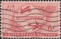 Red 6-cent U.S. postage stamp picturing airplanes