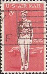 Red 8-cent U.S. postage stamp picturing Amelia Earhart and airplane