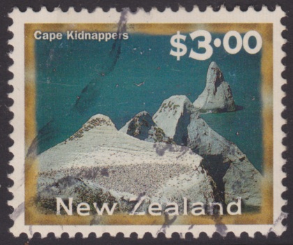 $3 New Zealand postage stamp picturing Cape Kidnappers on the North Island