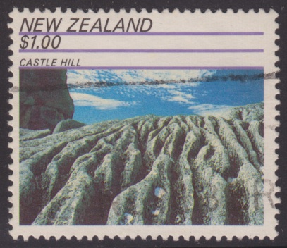 $1 New Zealand postage stamp picturing Castle Hill on the South Island