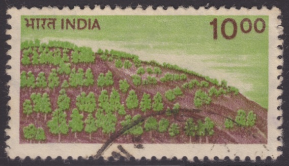Forest 10-rupee Indian postage stamp picturing a forest