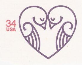 Purple & red 34-cent U.S. stamped envelope picturing birds in shape of heart